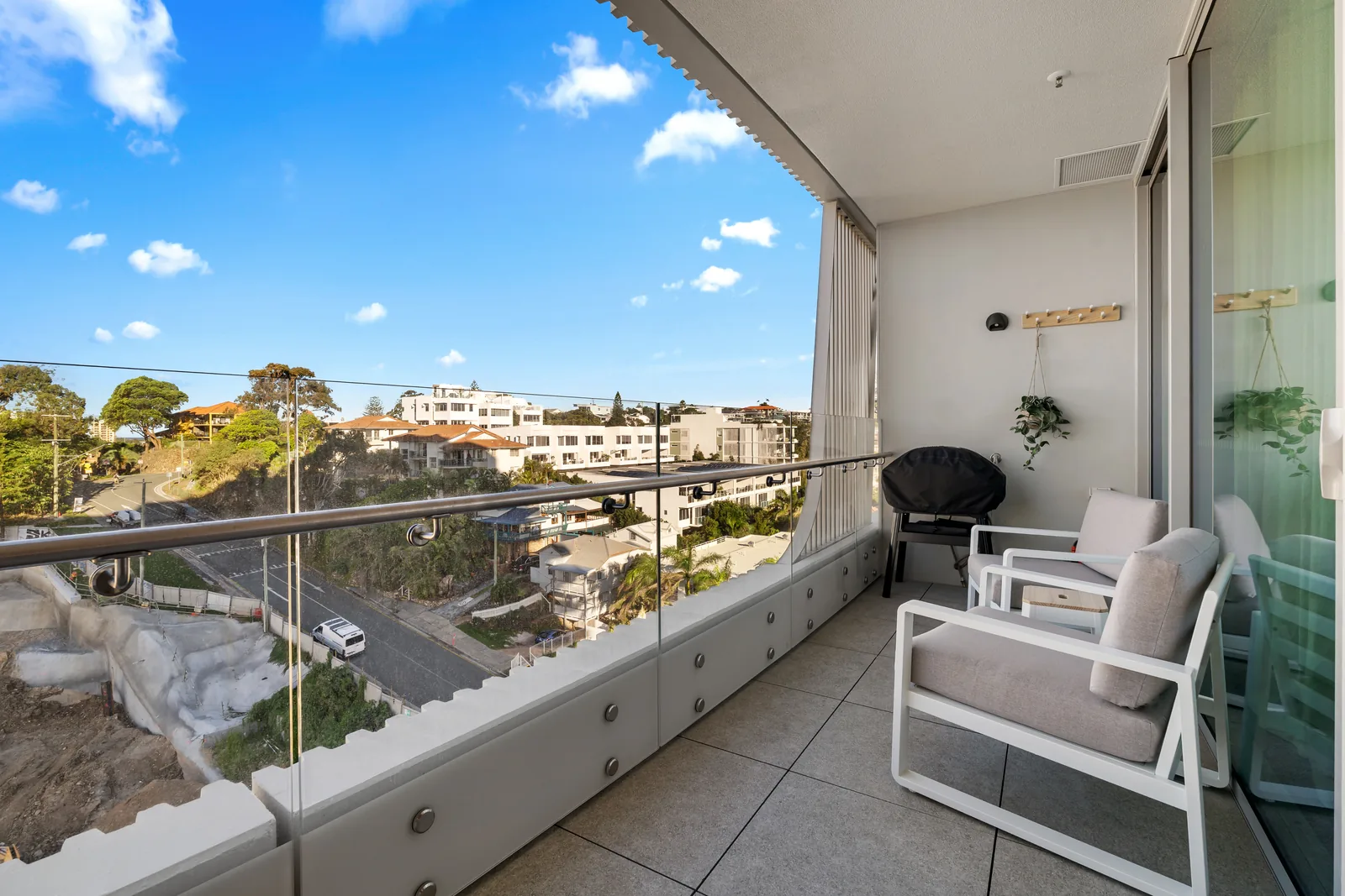 Balcony outlook over the leafy Kirra streetscape